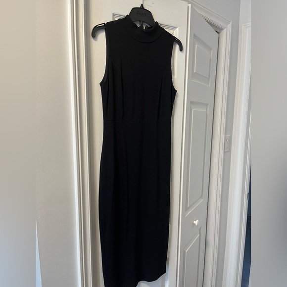 Black stretch pencil dress, high collar with zipper on back seam. - Picture 1 of 3